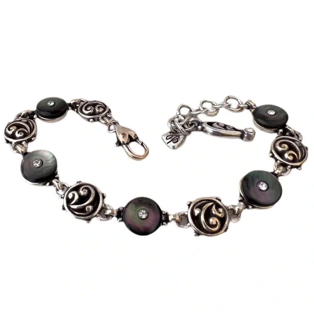 Brighton Bracelet Retired. Gray and silver plating has crystals in the center.